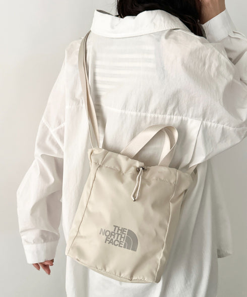 THE NORTH FACE(ザ・ノースフェイス)/ロゴプリント 軽量 巾着バッグ バケットバッグ ミニショルダーバッグ/BONNEY BUCKET BAG MINI | IM1261039 | クリーム