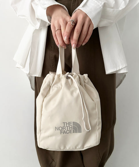 THE NORTH FACE(ザ・ノースフェイス)/ロゴプリント 軽量 巾着バッグ バケットバッグ ミニショルダーバッグ/BONNEY BUCKET BAG MINI | IM1261039 | クリーム