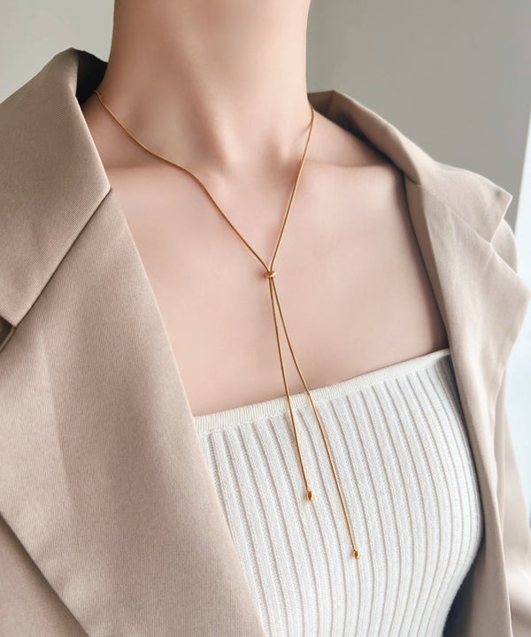 【ステンレス】スライダーボウタイロングネックレス | IS4221732 | ゴールド