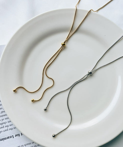 【ステンレス】スライダーボウタイロングネックレス | IS4221732 | ゴールド