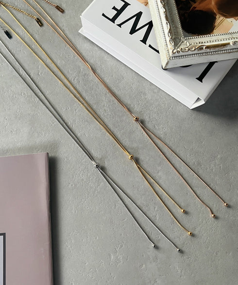 【ステンレス】スライダーボウタイロングネックレス | IS4221732 | ピンク