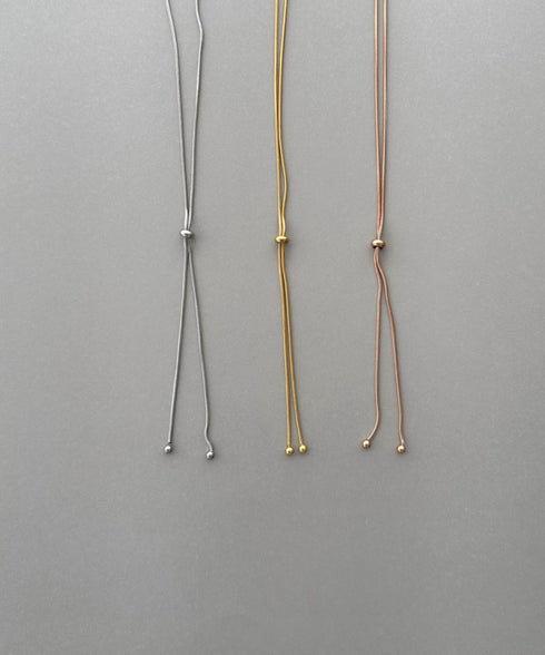 【ステンレス】スライダーボウタイロングネックレス | IS4221732 | ピンク