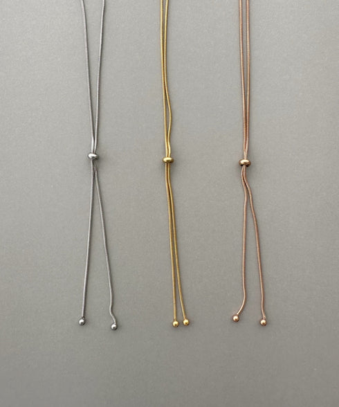 【ステンレス】スライダーボウタイロングネックレス | IS4221732 | ピンク