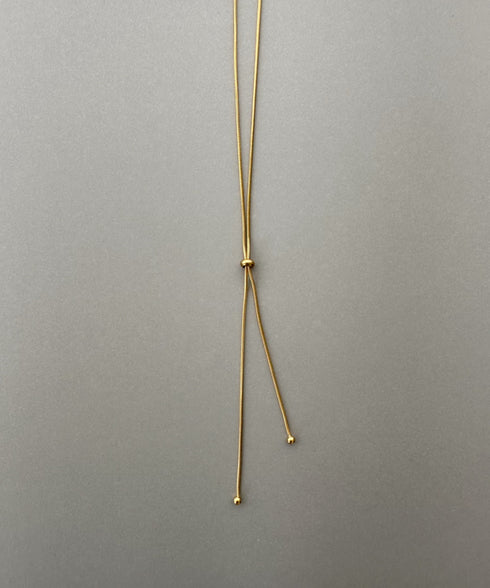 【ステンレス】スライダーボウタイロングネックレス | IS4221732 | ゴールド