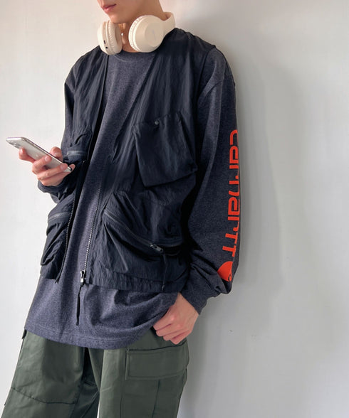 Carhartt(カーハート)/袖ロゴ ロンT USA規格 ルーズフィット ヘビーウェイト 6.75Oz ビッグサイズ オーバーサイズ コットン K231/ LOOSE FIT HEAVYWEIGHT LONG-SLEEVE LOGO SLEEVE GRAPHIC T-SHIRT | IM2233010 | ダークグレー