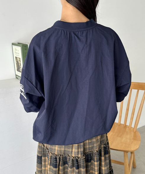 カレッジロゴ刺繍ナイロンプルオーバー | CL2233853 | ネイビー