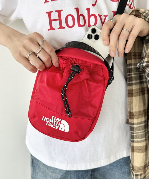 THE NORTH FACE(ザ・ノースフェイス)/巾着ポーチストリングショルダーバッグ スマホショルダー/BREEZE CROSS BAG | IM1243026 | レッド