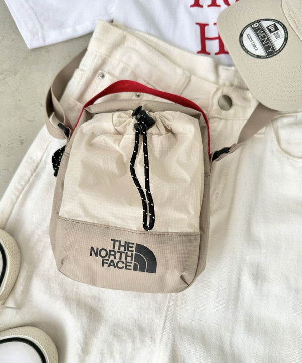 THE NORTH FACE(ザ・ノースフェイス)/巾着ポーチストリングショルダーバッグ スマホショルダー/BREEZE CROSS BAG | IM1243026 | サンドベージュ