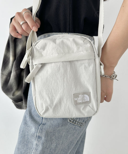 THE NORTH FACE(ザ・ノースフェイス)/長さ調整可能 ワンポイント ロゴ刺繍 ショルダー クロス ミニバッグ/TRAVEL CROSS BAG S | IM1243028 | ホワイト