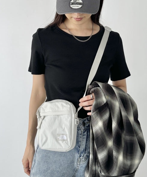 THE NORTH FACE(ザ・ノースフェイス)/長さ調整可能 ワンポイント ロゴ刺繍 ショルダー クロス ミニバッグ/TRAVEL CROSS BAG S | IM1243028 | ホワイト