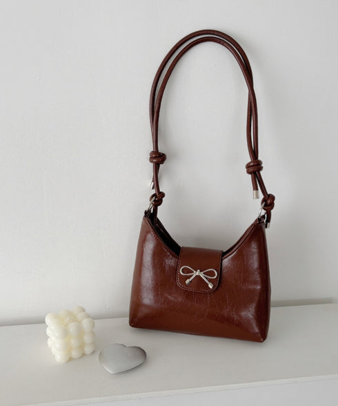 リボンモチーフワンハンドルPUホーボーバッグ | CL1246027 | ブラウン