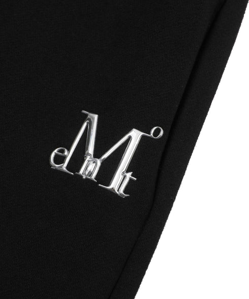 MUCENT(ムセント)/ユニセックス ワイド ルーズ ロゴ ジョガー スウェットパンツ/LASH METAL LOGO JOGGER SWEAT WIDE PANTS UNISEX | AT2252030 | ブラック