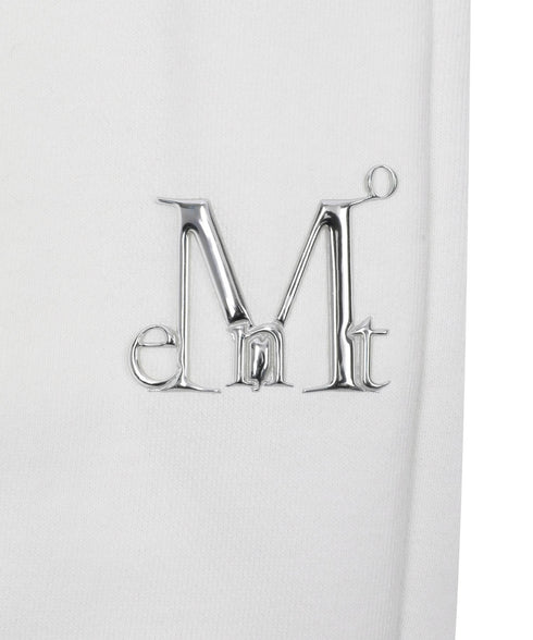 MUCENT(ムセント)/ユニセックス ワイド ルーズ ロゴ ジョガー スウェットパンツ/LASH METAL LOGO JOGGER SWEAT WIDE PANTS UNISEX | AT2252030 | アイボリー