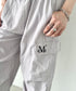 MUCENT(ムセント)/ワイド ルーズ イージー カーゴパンツ/GROSS NYLON PARACHUTE CARGO PANTS | AT2252031 | グレー