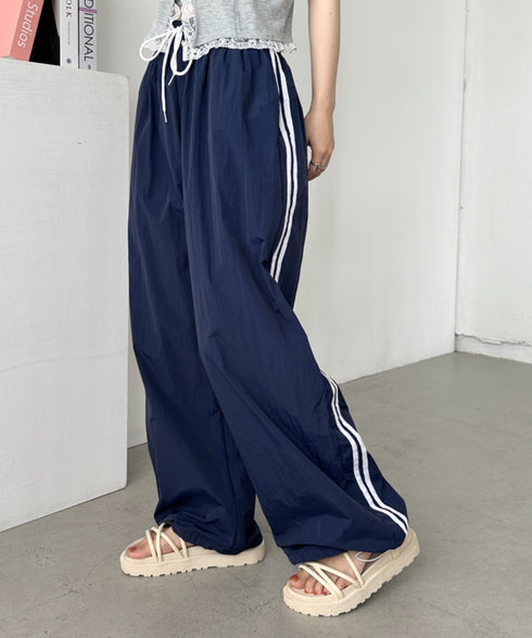 サイドラインナイロントラックパンツ | CL2255045 | ネイビー