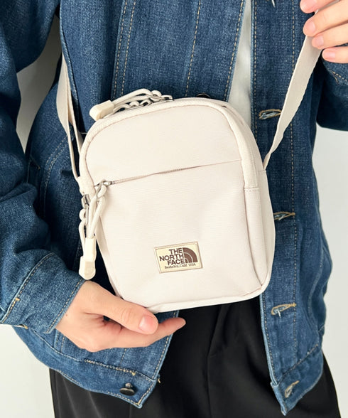 THE NORTH FACE(ザ・ノースフェイス)/長さ調整可能 軽量 ワンポイント ショルダー クロス ミニバッグ/STANDARD CROSS BAG S | IM1254073 | クリーム