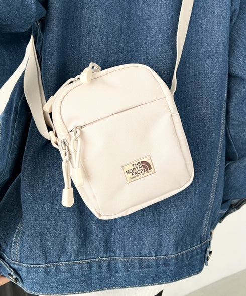 THE NORTH FACE(ザ・ノースフェイス)/長さ調整可能 軽量 ワンポイント ショルダー クロス ミニバッグ/STANDARD CROSS BAG S | IM1254073 | クリーム