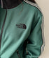 THE NORTH FACE(ザ・ノースフェイス)/トラックジャケット トラックブルゾン ジャージ  スタンドネック  ロゴ刺繍/TNF TRACK JACKET | IM2254101 | グリーン