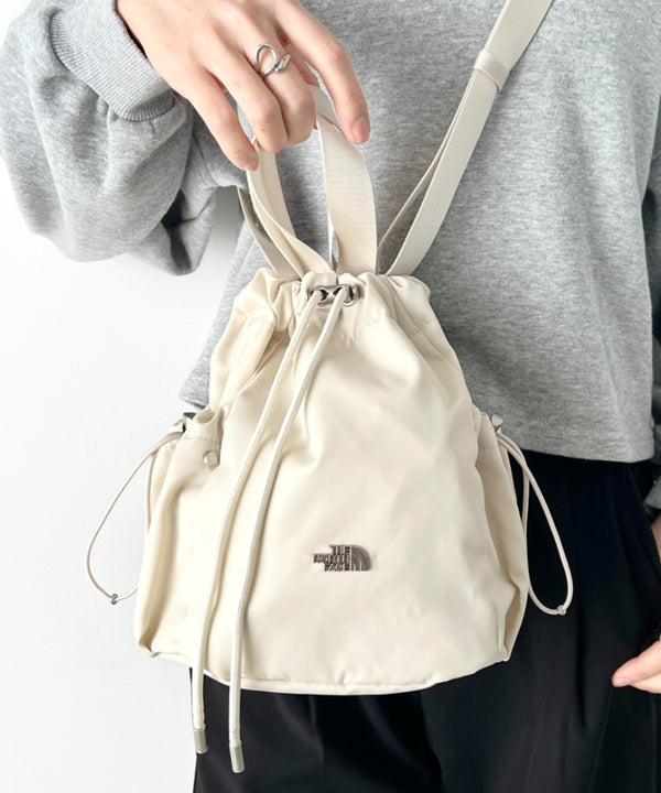 THE NORTH FACE(ザ・ノースフェイス)/軽量 巾着バッグ バケットバッグ ミニショルダーバッグ/BONNEY BUCKET BAG MINI | IM1261010 | クリーム