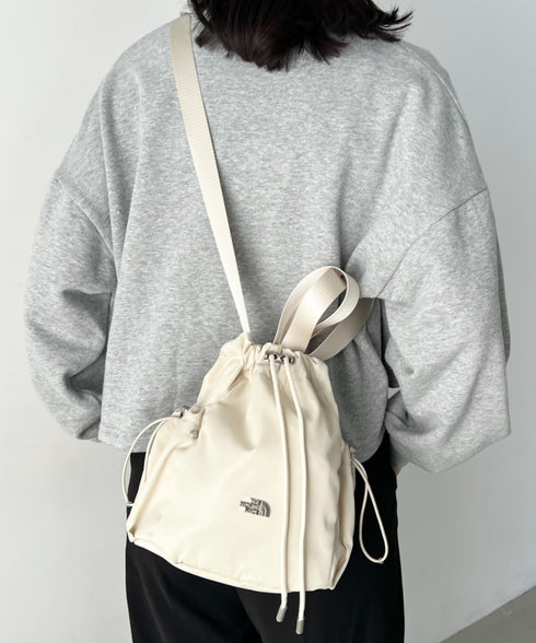 THE NORTH FACE(ザ・ノースフェイス)/軽量 巾着バッグ バケットバッグ ミニショルダーバッグ/BONNEY BUCKET BAG MINI | IM1261010 | クリーム