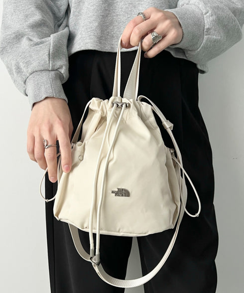 THE NORTH FACE(ザ・ノースフェイス)/軽量 巾着バッグ バケットバッグ ミニショルダーバッグ/BONNEY BUCKET BAG MINI | IM1261010 | クリーム