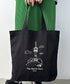 国内未発売 THE NORTH FACE(ザ・ノースフェイス)/A4対応 大容量 プリント コットン キャンバストートバッグ/TNF COTTON TOTE SEOUL | IM12410399 | ブラック系その他
