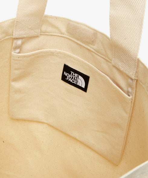 国内未発売 THE NORTH FACE(ザ・ノースフェイス)/A4対応 大容量 プリント コットン キャンバストートバッグ/TNF COTTON TOTE SEOUL | IM12410399 | クリーム