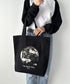 国内未発売 THE NORTH FACE(ザ・ノースフェイス)/A4対応 大容量 プリント コットン キャンバストートバッグ/TNF COTTON TOTE SEOUL | IM12410399 | ブラック