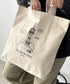 国内未発売 THE NORTH FACE(ザ・ノースフェイス)/A4対応 大容量 プリント コットン キャンバストートバッグ/TNF COTTON TOTE SEOUL | IM12410399 | クリーム
