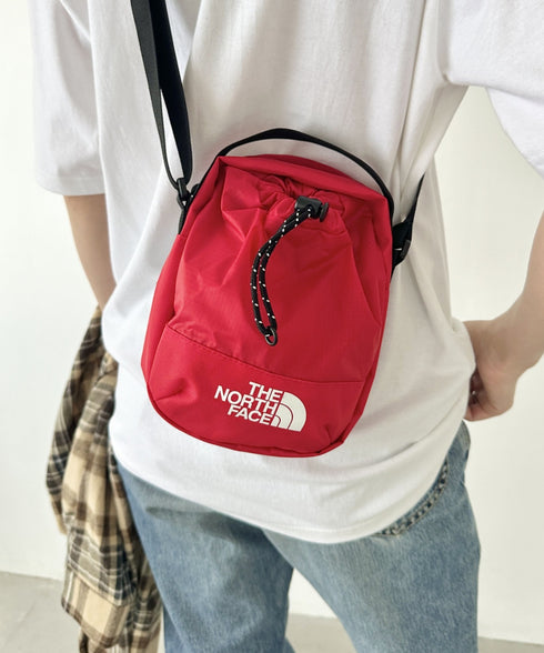 THE NORTH FACE(ザ・ノースフェイス)/巾着ポーチストリングショルダーバッグ スマホショルダー/BREEZE CROSS BAG | IM1243026 | レッド