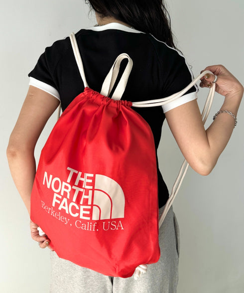 THE NORTH FACE(ザ・ノースフェイス)/ビッグロゴ 巾着 ナップサック ストリングバッグ/BIG LOGO STRING BAG | IM1251060 | オレンジ