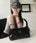 MUCENT(ムセント)/2WAY ショルダー クロスバッグ/BARB METAL LOGO 2-WAY EYELET CROSS BAG | AT1253083 | ブラック